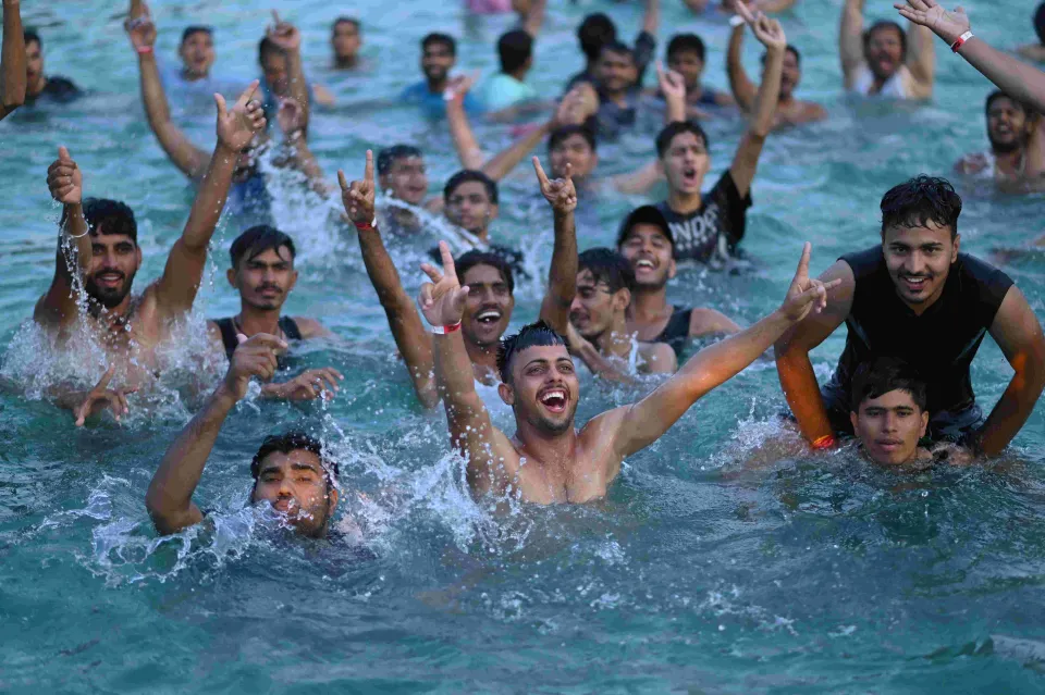 Young guests cheering in the wave pool at Shagun Resorts, Jodhpur