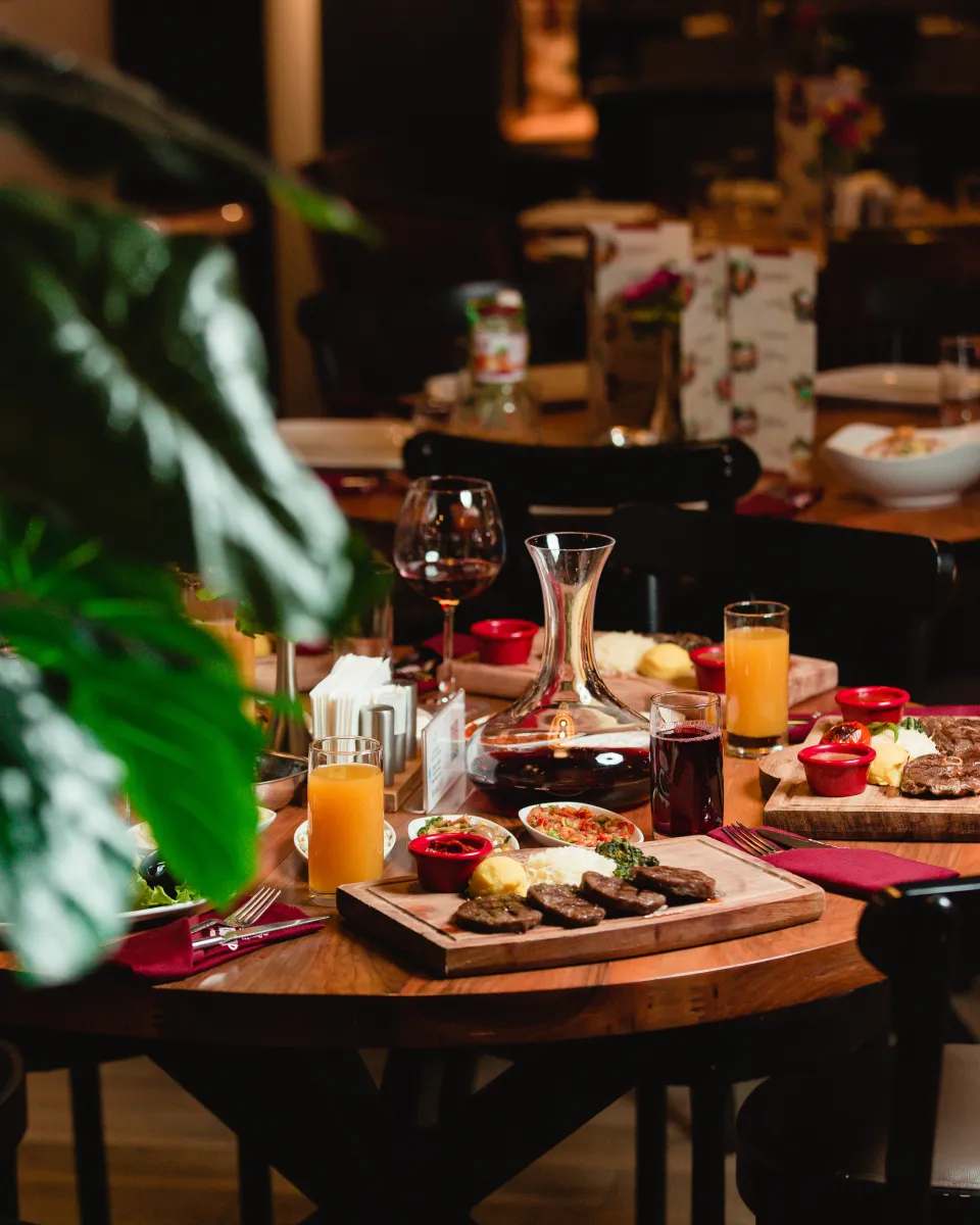 Restaurant table set with food and drinks